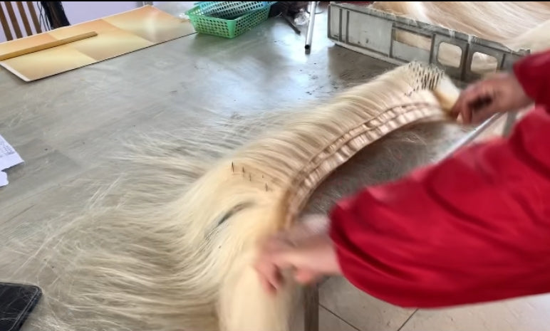 Load video: About the process of making hair in the factory.